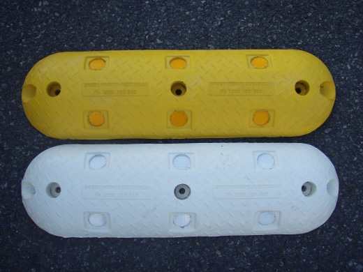 Yellow and white rubber rumble bars