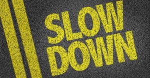 slow down painted on tarmac | impact of lowering road speed limits | SHA