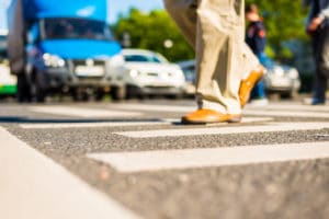 person walking on a pedestrian crossing