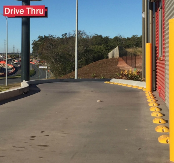 speed humps avoid car damage and gutter rash at drive throughs